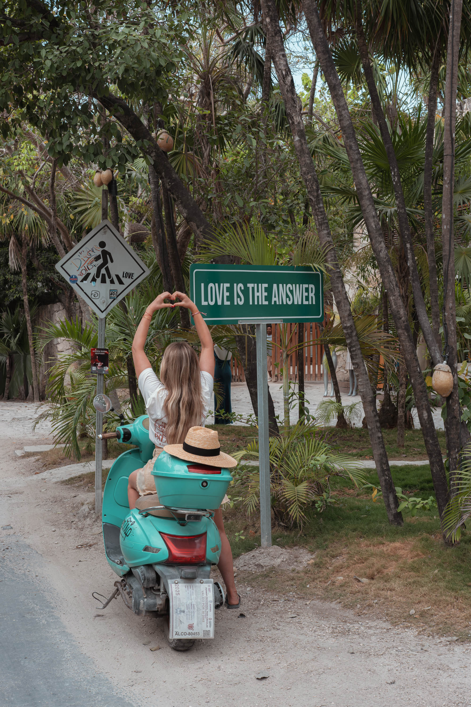 Love is the answer sign, Tulum - Faraway Getaway